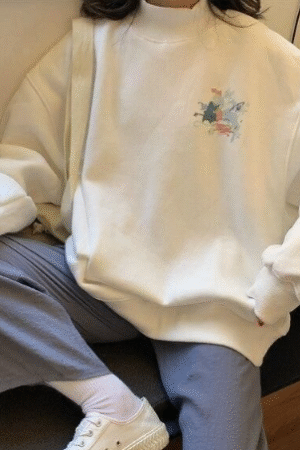 Oversized White Sweatshirt with Minimal Floral Detail