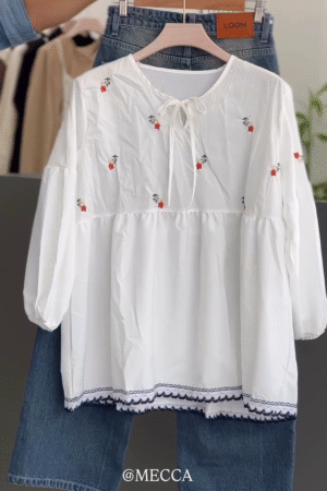 Elegant White Embroidered Peplum Top for Women
